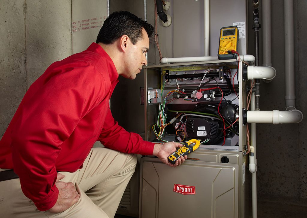 Heating technician diagnosing a furnace repair in Citrus Heights