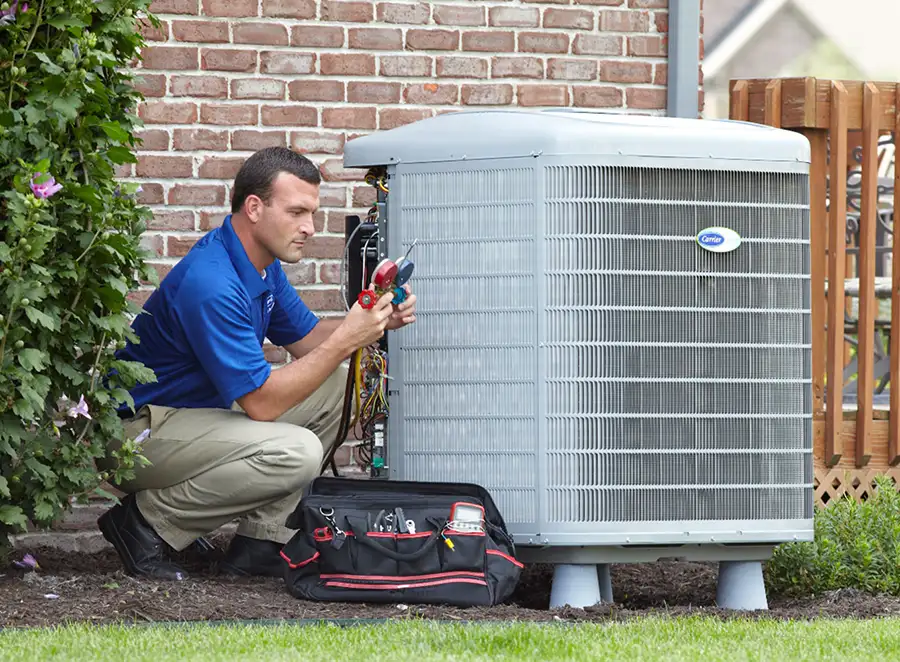HVAC technician inspecting an outdoor AC unit in Citrus Heights