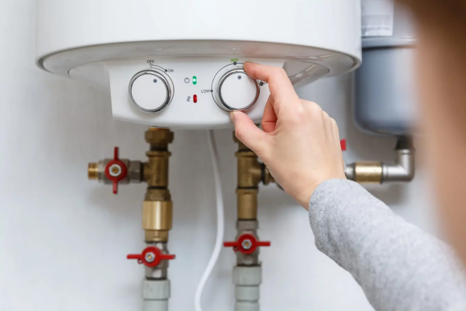 Technician adjusting a water heater in Citrus Heights